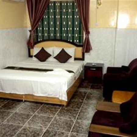 Golden Boat Guesthouse พนมเปญ ห้อง รูปภาพ