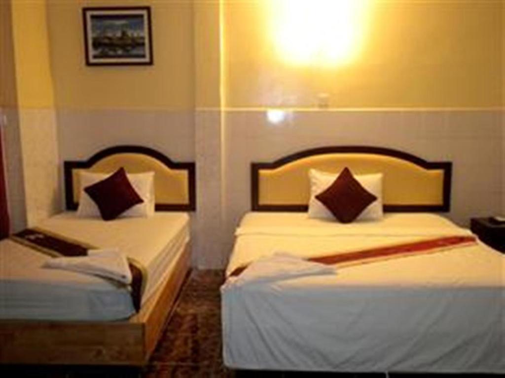 Golden Boat Guesthouse พนมเปญ ห้อง รูปภาพ