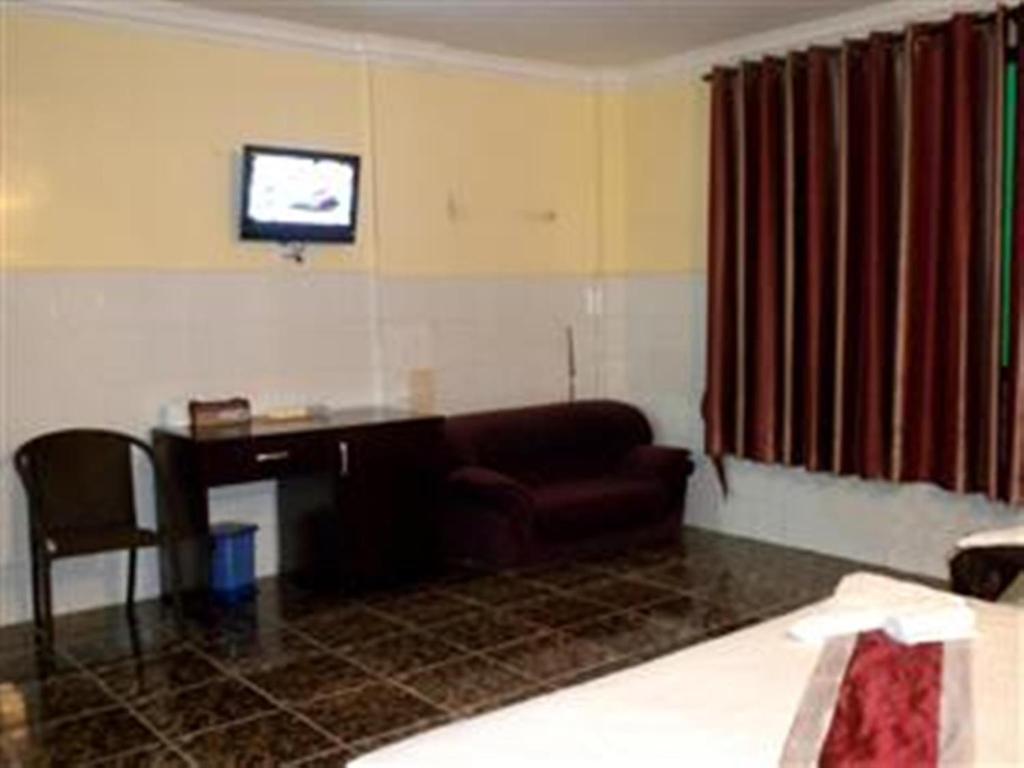 Golden Boat Guesthouse พนมเปญ ห้อง รูปภาพ
