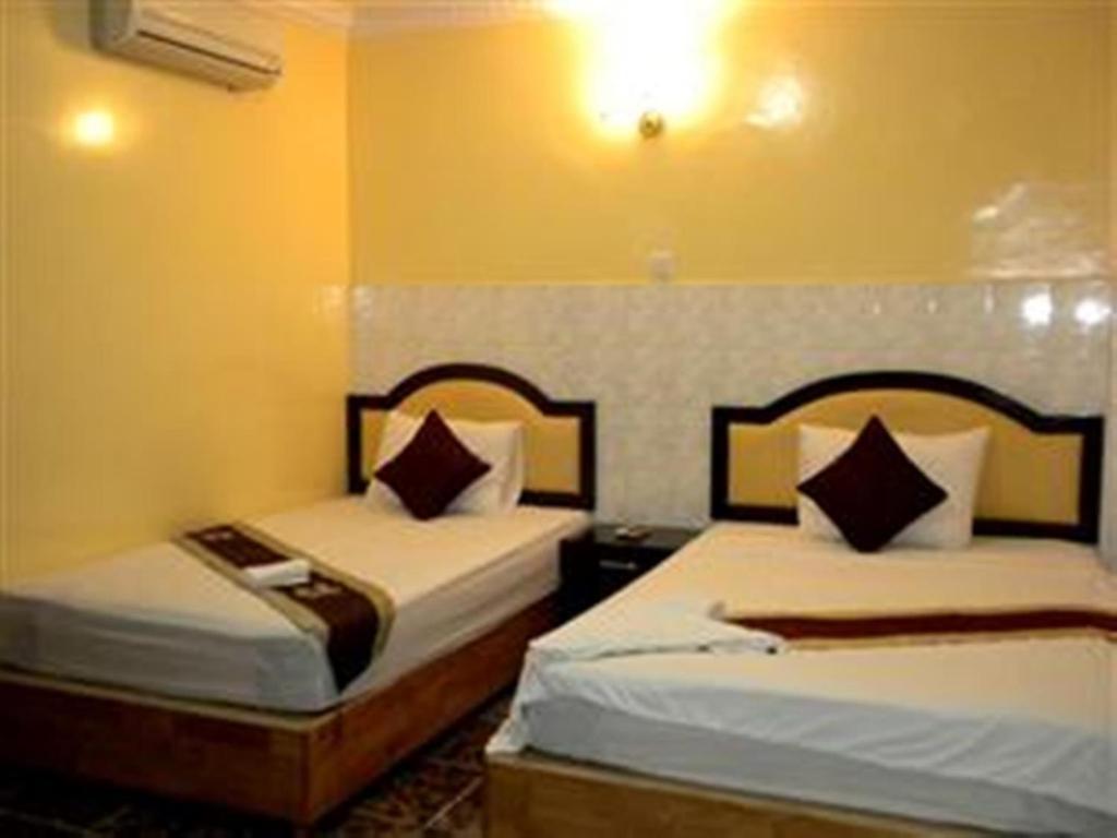 Golden Boat Guesthouse พนมเปญ ห้อง รูปภาพ